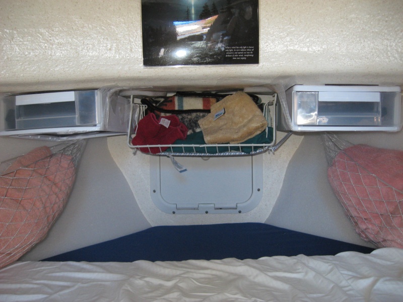 prototype storage for light stuff bungeed and taped up till tested in use, there is ample foot space