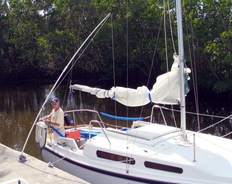 Putting everything back on the boat after rerigging.