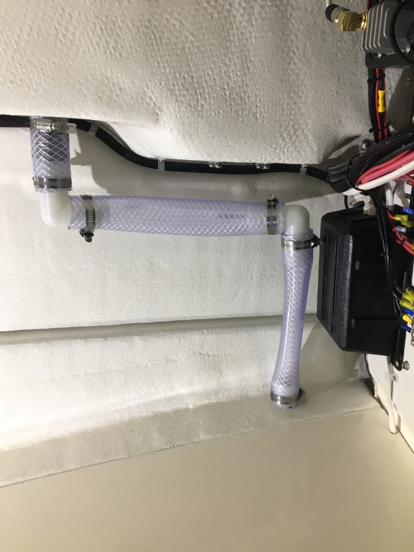 PVC pipe installed with wood cleat for securing glassed in behind it.