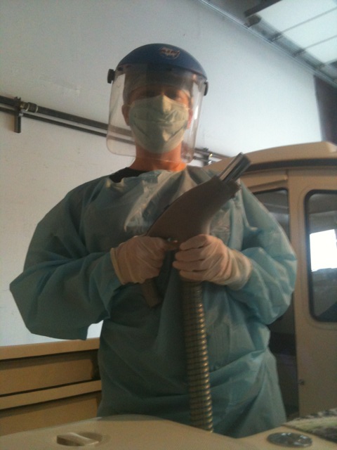 Rachel all geared up to tackle any fiberglass debris that comes her way. I was in short sleeves caked in 4200.