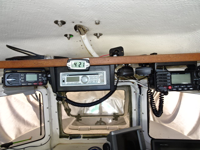 Radios and stereo on bottom of shelf.  Extra cigarette lighter plug for power to i pod, or other device.