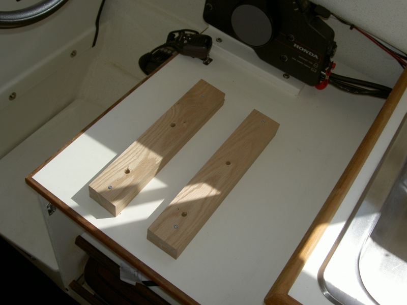 Raising the helm seat two inches.  I added oak supports and bought 4  machine screws (3", 10/24).  Drill holes in the oak supports, line up carefully and secure with screws.  Much more comfortable and better visibility, even with trim tabs.  A quick and easy project.