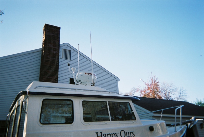 Raymarine Radar & GPS on ESM Mount with All Around Light; Digital AM/FM Antenna mounted on Port Side, Digital VHF Antenna mounted on Stbd. Side.