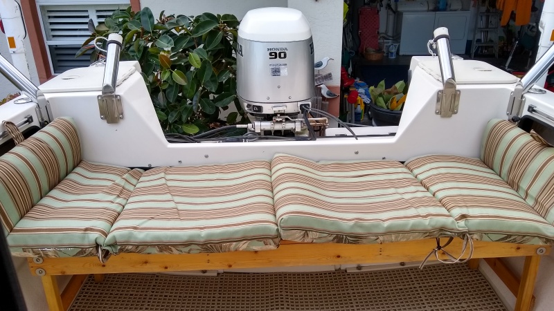 Rear bench seat with cushions