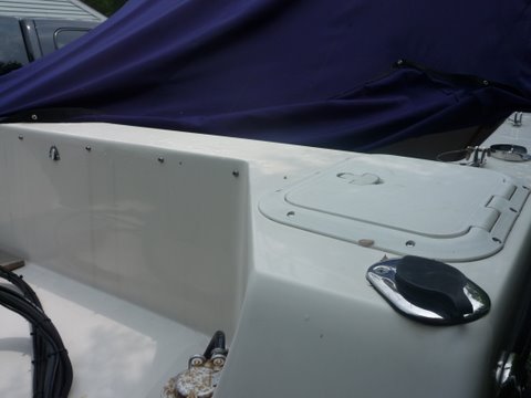 rear of motor well with dink bracket removed, will screw snap back in for use when we don't use the dink motor bracket
