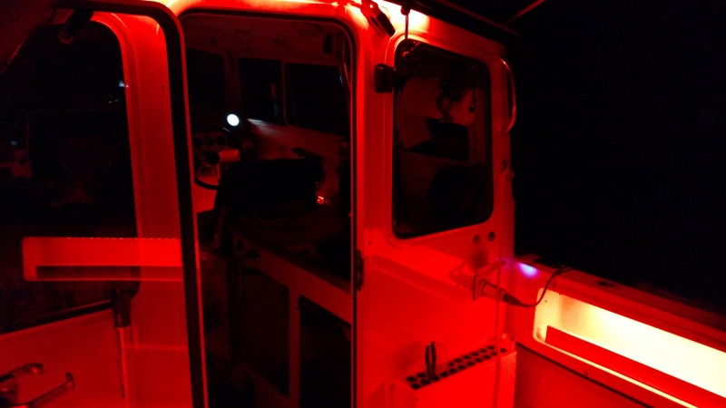 Red LEDs in side pockets light up the cockpit