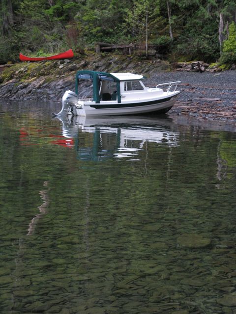 Reflections on a red canoe...