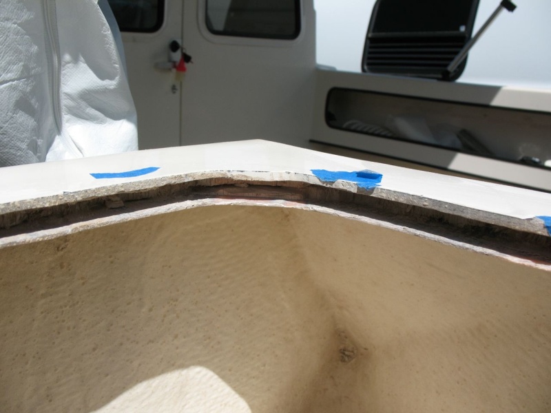 Removing perimeter balsa core, to be replaced with thickened epoxy.