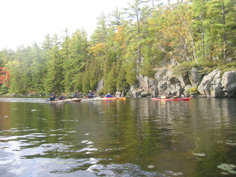 Rendezvous with fishing friends in canoe