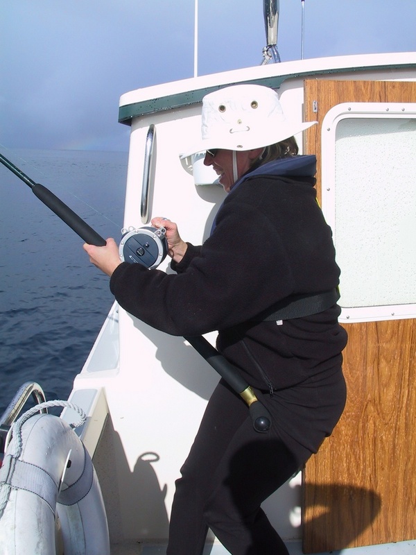 Rene fighting big halibut