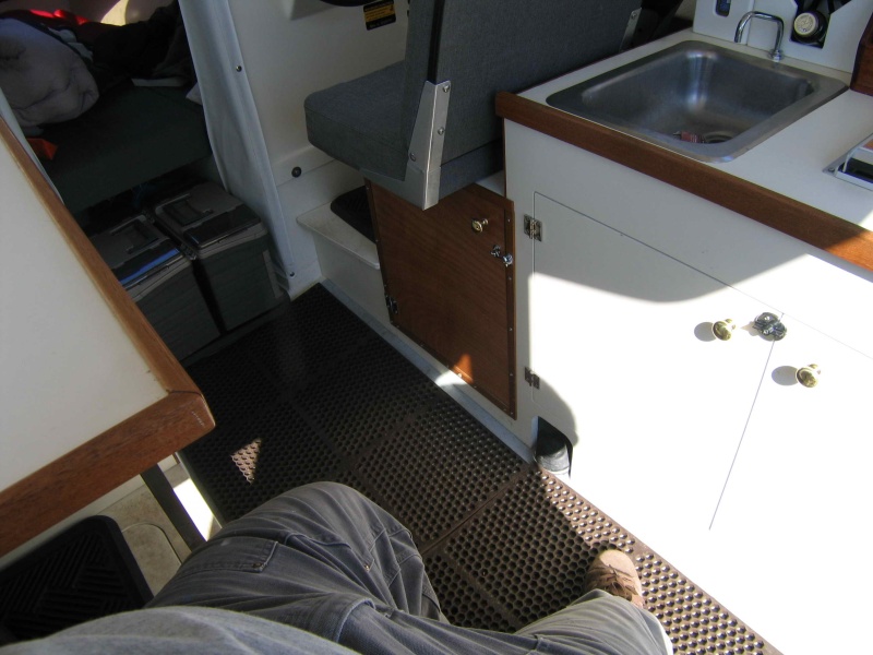 Replaced Ice Box with Cabinet.  Made of Marine Grade Meranti Plywood, trimmed out in Teak