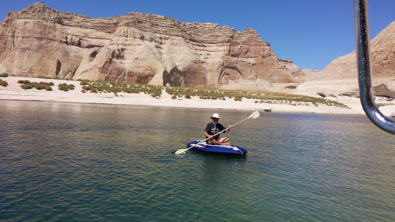 Rob taking photos and paddling on a WindGlider