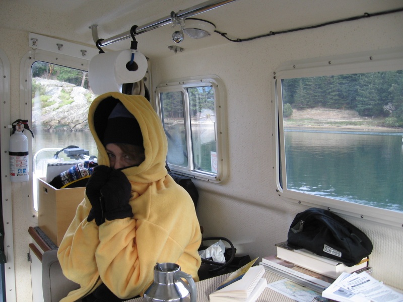 Robbin trying to get the Wallas to warm her up after morning hike.