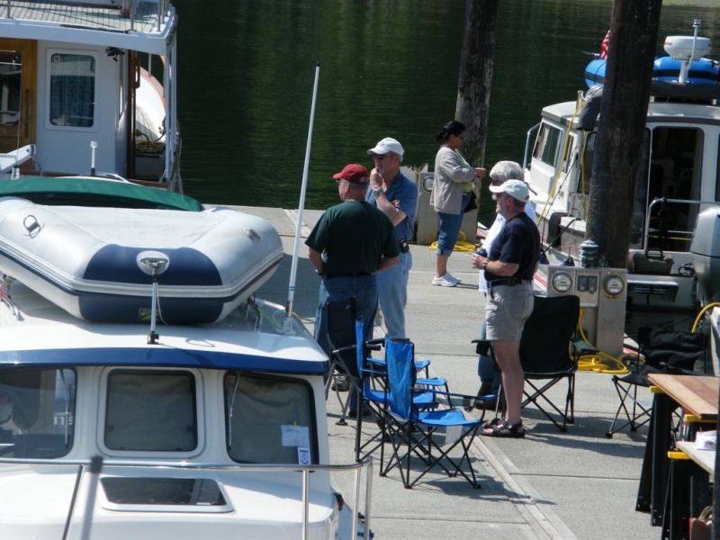 Roger, Barry, Fred and Dan watching the entertainment of docking at Langley.