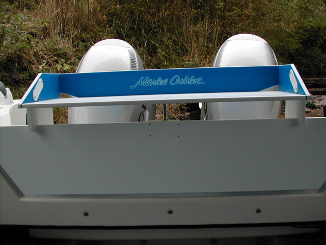 (rogerbum) 1/2" Starboard transom board retained with 1/2" aluminum C-channel, magma filet table