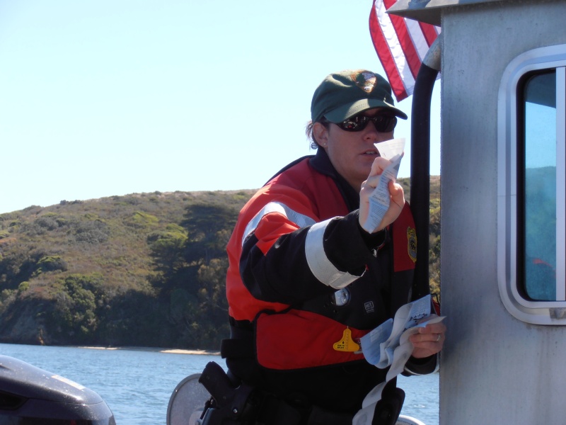 Rookie Ranger is checking fishing licenses for validity