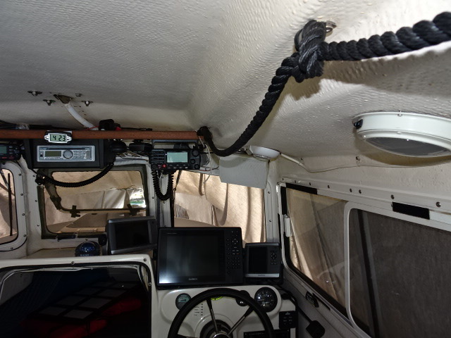 Rope hand rail (and towel hanger) over head.  Velcro, to support interior curtains, between snaps, and allow window opening, with partial window coverage.
