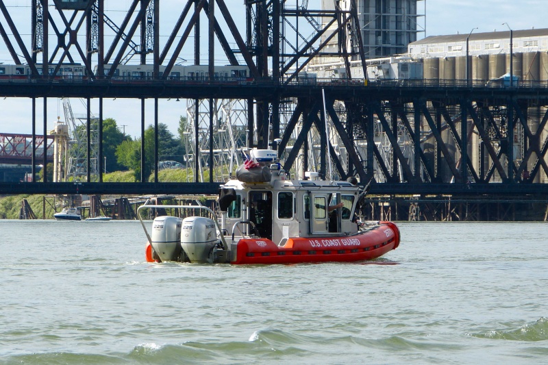 Rose Festival - Coast Guard Patrol by Navy ships