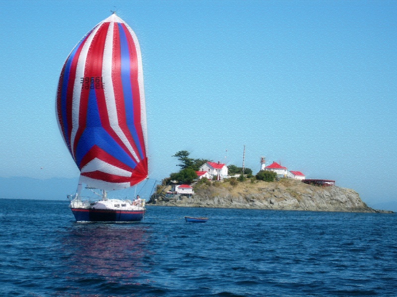 Sailboat at Chrome Island Lighthouse, B.C.