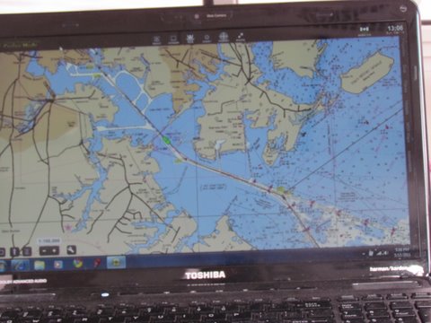 screen shot of us heading into Baltimore. the black line heading off to the right from were the two channels form a Y is the next days heading to the other side of the bay put the green boat on the line click on the autopilot and watch for debris etc steer with hand held auto pilot remote control,that leaves our 4208 Garmin to run radar or a chart with radar over lay