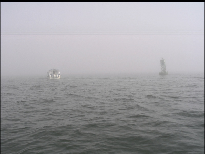 Sea Angel leads ALMA'S ONLY  across Thimble Shoel Channel, ENE of the Hampton Roads Bridge Tunnel (Rte 64) that joins Norfolk and Hampton, Virginia. Dave was our guardian angel for the 200NM trip north.