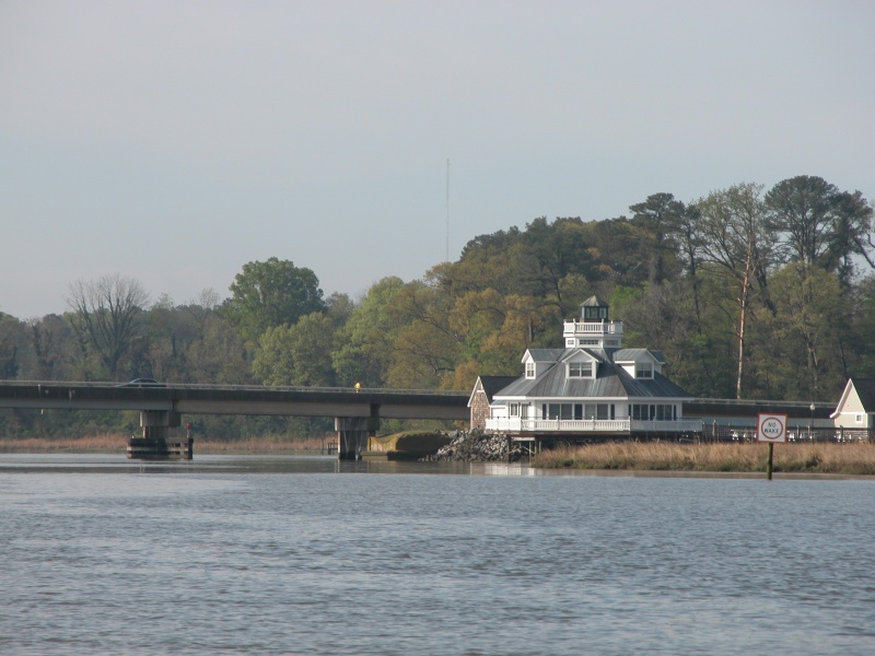 (Sea Angel) Pagan River with the locally famous Smithfield Station "Lighthouse" with its honeymoon suites and a better view of the VA.  Business Route #10 bridge.