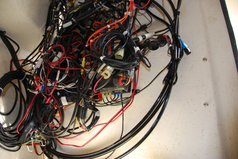 Sea Angel's (2012-12-14) Before installation view for the power distribution expansion. Such a wiring mess to refine and work with. I hope to unroll all those cables and either resize or relocated. The 2 engine harness cables will be the most challenging.