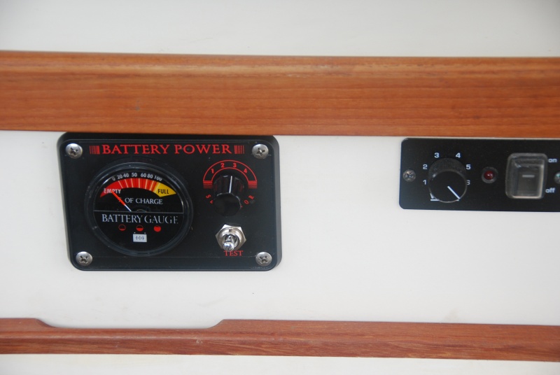 Sea Angel's Battery Power Meter - 1

The 4 position switch allows me to test the existing 3 batteries and to add a 2nd house battery that can also be tested (in the future). The tester is disconnected until the spring loaded 'test' switch is pushed down.

The 4 conducter harness is run behind the head, following the existing harness bundle to the stern, directly (fused) to each battery.