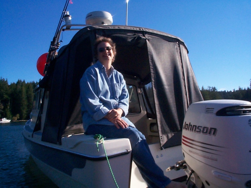 (seabran) Karen on stern of SeaSpray - Squirrel Cove, Cortes Island.