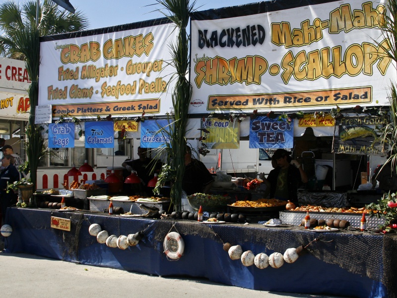 Seafood Festival booths in Battery Park. Apalachicola has several outstanding seafood eateries.