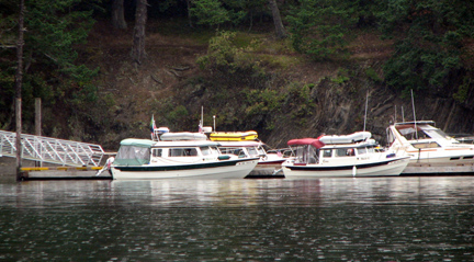 Several C-Dorys at the dock at Prevost Harbor