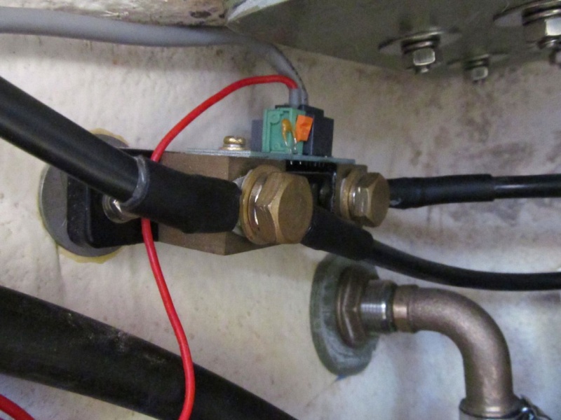 Shunt for Victron battery monitor. This goes between house battery and negative bus (loads).  See note in previous photo(s) explaining why there are dangling wires, etc.