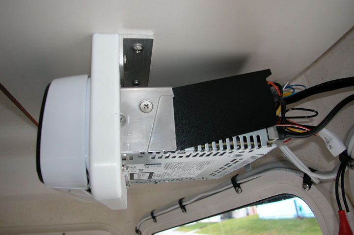 Side view of my mounting system for the Sony unit.  Just a piece of King starboard and piece of aluminum angle.  Works well.