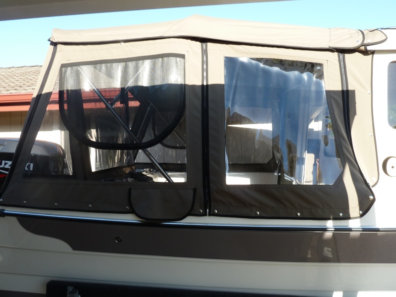 Side view showing smile windows with screens and extra panel forward to facilitate entry. Note: top panel can also be zipped to center.