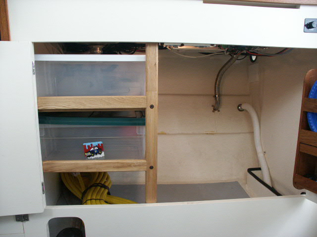 Simple shelves under sink