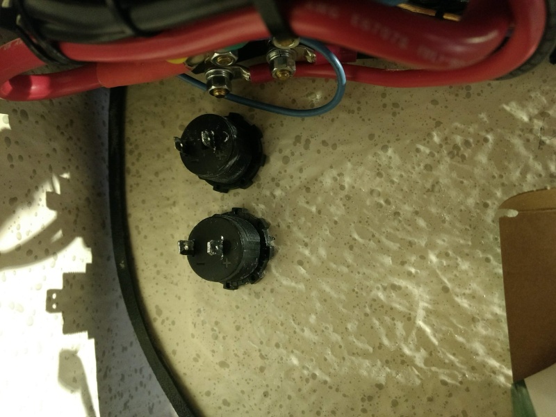 Since I removed the cigarette lighter/socket to put in my windlass switch, I added 2 new 12v sockets down lower on the bulkhead. One will be used to plug in the fridge.