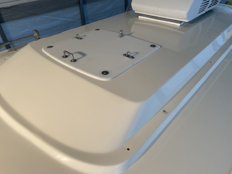 Since NOTHING will adhere to Starboard, I used butyl tape between the bottom of the holes where they met the cabin top.. tight acorn nuts underneath with fender washers make a  durable seal