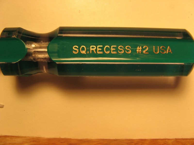 Size of driver you need for these screws.      

Also called a Robertson head, I think.