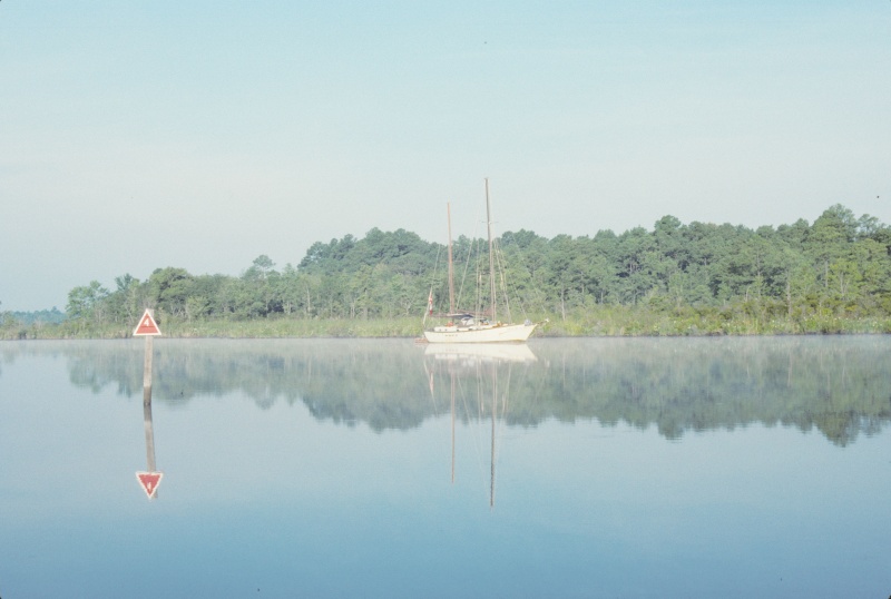 Sloop near West Neck Creek entrance in the morning mist.

Scanned slide taken in July 1989