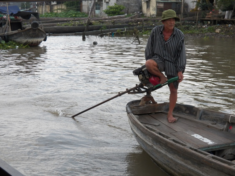 Smaller boats had lawn mower size engines.  Steering with your feet seemed to be popular.  He might be looking for his flip flop.