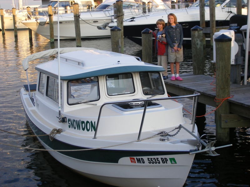 Smallest boat in the marina, but having the most fun