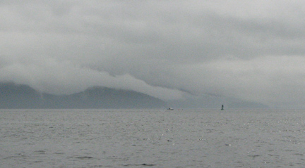 Smooth water, cloudy enroute