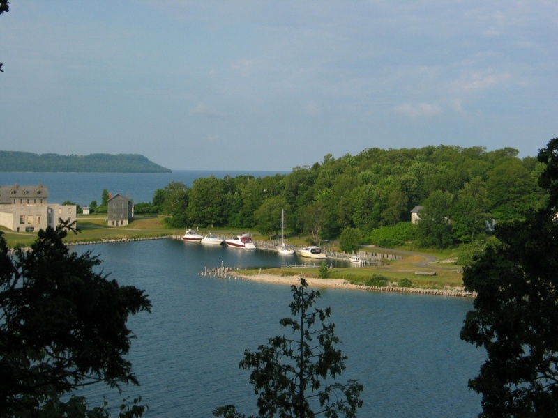 Snail Shell Harbor Fayette MI. One of the best destinations on the Great Lakes. Nice park, nice history, nice walking, great views, NO shopping. Jointly run by DNR and Historical Commission, good dockage, no electric or services. Water and pit toilets 50 to 110 yards away.