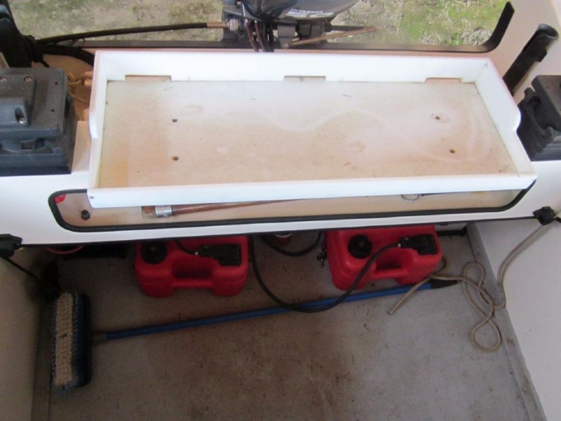 So, in addition to eliminating the deck penetrations, I'm hoping to clean up this mess.  You can just barely see the fuel filter screwed to the deck between the gas cans, which are screwed to the deck inside of the battery trays, which are also screwed to the deck.  All screws go into the balsa core.