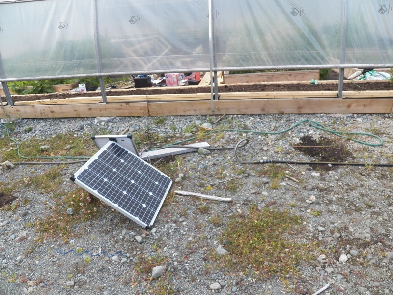 Solar power runs a drip irrigation.  It was quite warm inside even with the vents open.