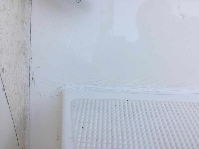 Spider cracks on starboard side of cockpit