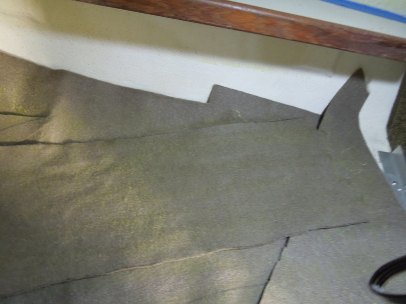 Spray the backside of the carpet, I used carpet remnants around the sides to catch over spray. These remnants can still be used