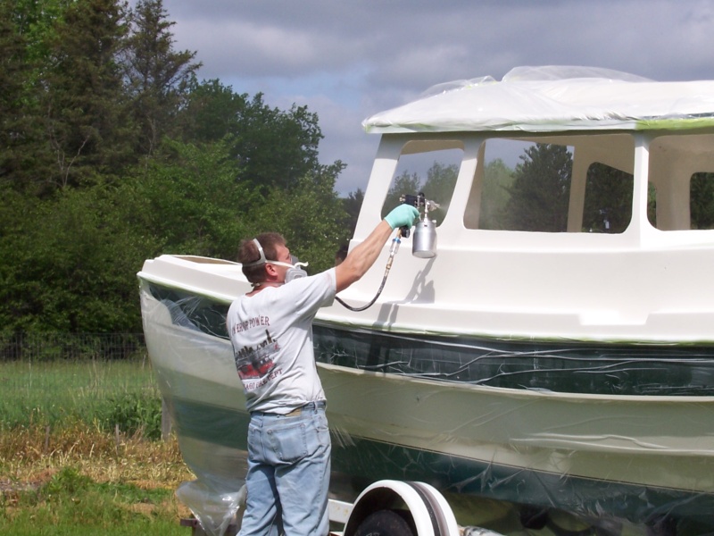 Spraying new paint over Epoxy primer.