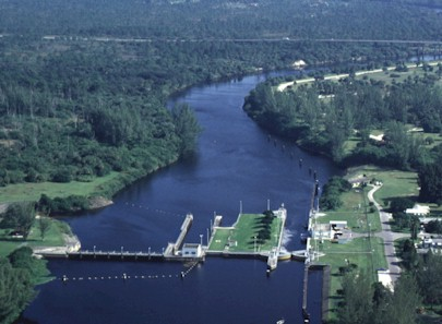 St. Lucie Lock: Lock chamber:50'x250'- Vertical lift:Sea level to current St. Lucie Canal water level 14.5' normal. Operates daily 6:00A to 9:30P-Marine VHF radio Channel 13-Located at Okeechobee Waterway 
statute mile 15.5