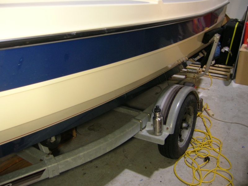 Standard EZ Loader single axle roller trailer with side guides and Spare tire.